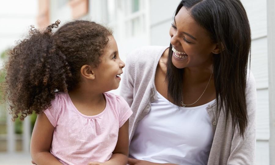 Adult woman and child talking