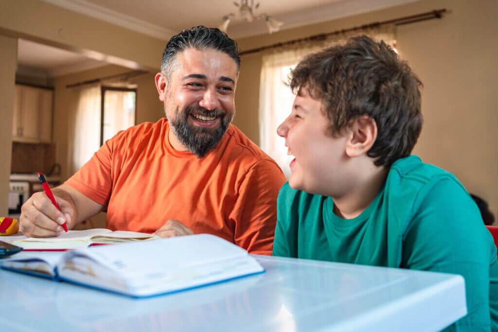 Dad and son doing homework
