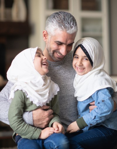 Afghan dad and daughters